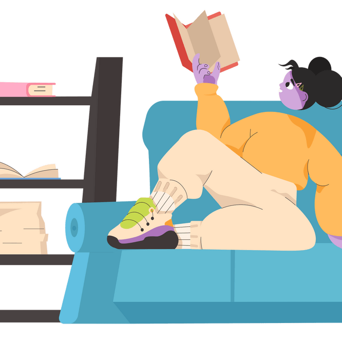 Woman reading a book on a couch. She is reading a book recommended by SCBA.