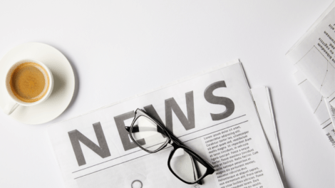 Image with white background and a cup of coffee, a newspaper and reading glasses to illustrate that this is the News Page for Senior Care Business Advisors Press Releases.