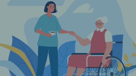 Caregiver handing cup of coffee to elderly woman in a wheelchair.